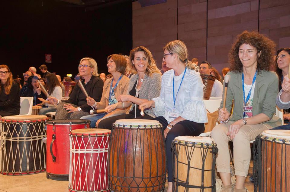 team building rhythm science drum circle corproate teambuilding benefits stress at work